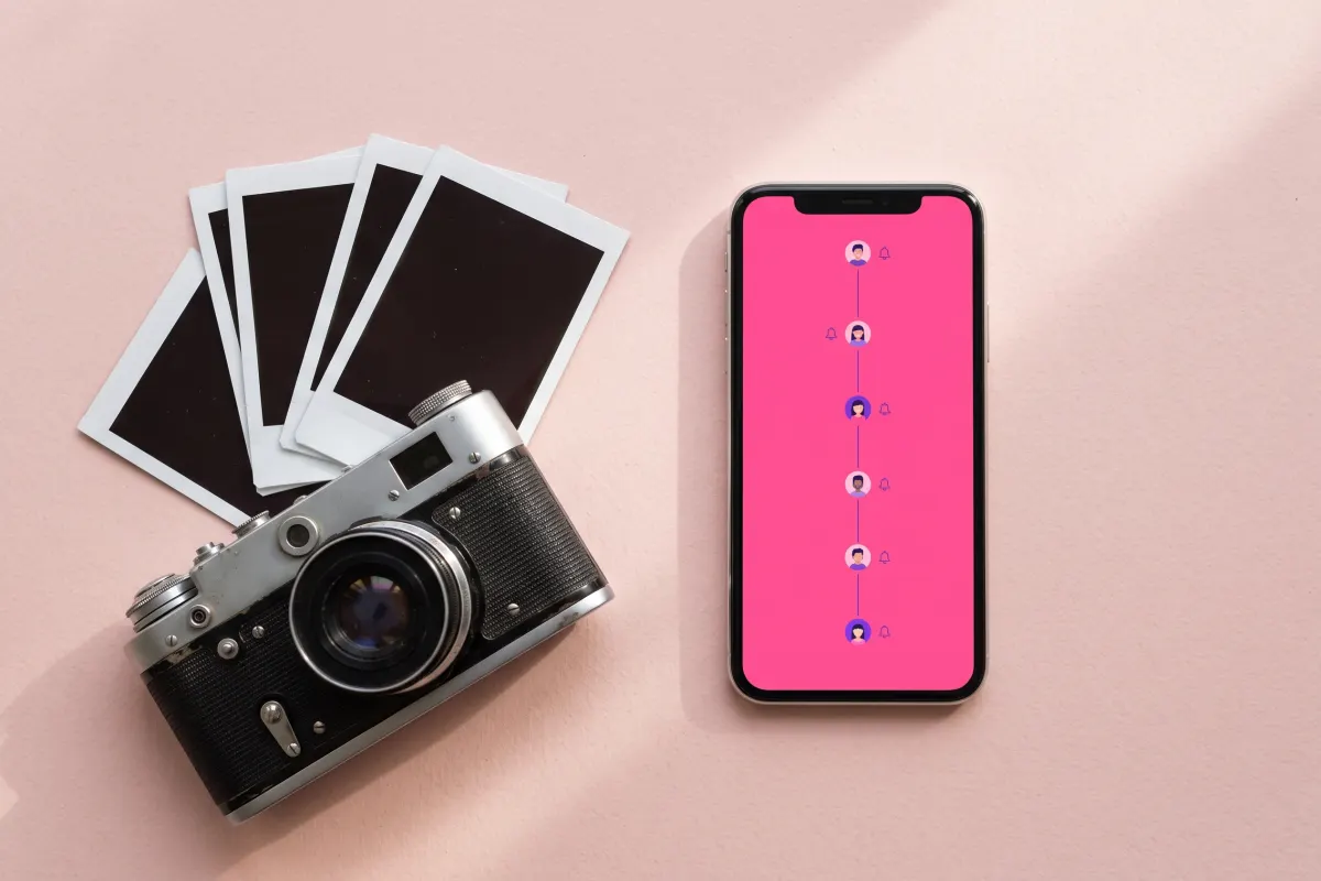 Vintage camera and instant photos next to a phone showing a live follow timeline with alert bells